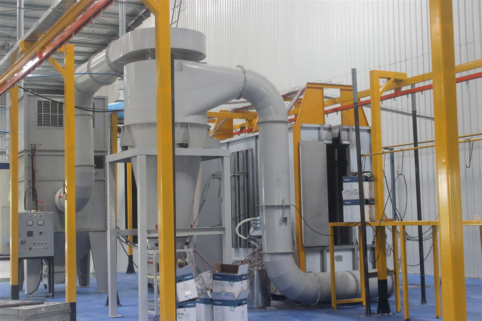 Dust extraction system on the powder coating line